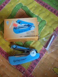 Mini Handheld Sewing Machine