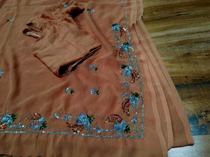 Elegant heavy Peach Saree