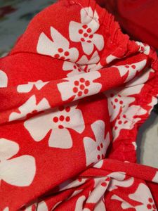 Red Top With Floral Design