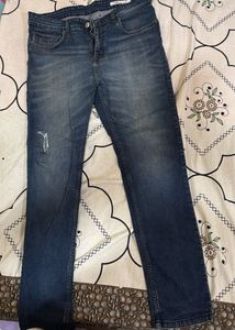 Distressed Denim Jeans