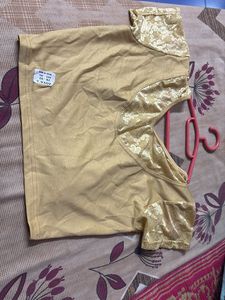 Golden Blouse with Floral Accents