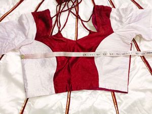 Maroon &amp; white lehenga choli.