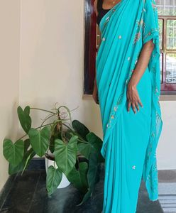Teal Blue Colour Saree With Heavy Work Pallu.