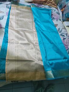 Teal Blue Saree with Gold Border