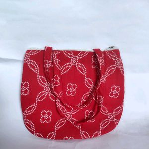 Read Colore Bandhani Print Handbag👜