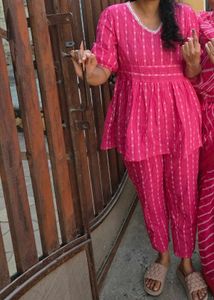 Pink tunic with white details