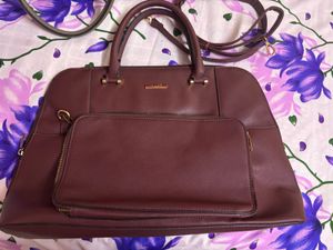 Elegant Burgundy Handbag with laptop sleeve