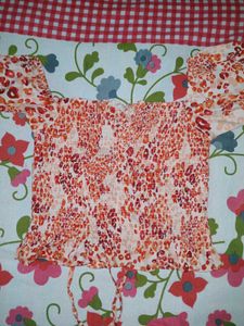 Orange Animal Print Smocked Top