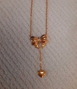 Anti Tarnish Heart Themed Bow Inspired Pendant