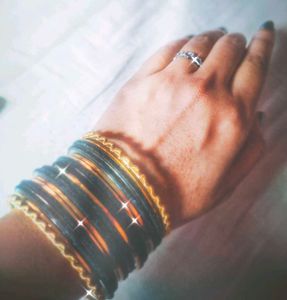 golden and black bangles