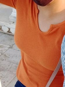 A Orange Color Top. Size - M