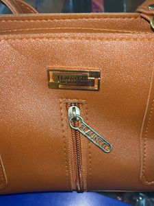 Flounett Brown Handbag