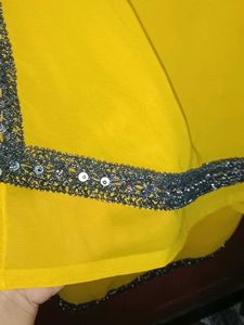 Yellow colour Saree without blouse and peticoat