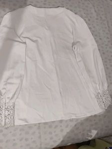 A White Shirt With Pearls