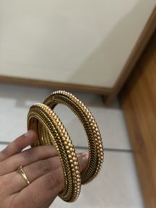 Golden Bangles With Pink Colour Pearls
