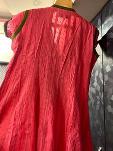 Party Wear Carrot Colour Cotton Anarkali With Embroidery &amp; Lace And Green Dupatta