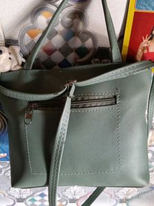 Elegant Green Handbag with Floral Detail