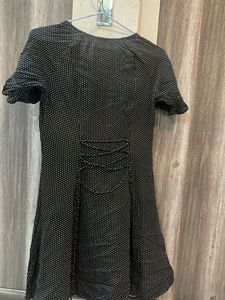 Black coloured white dotted pattern dress
