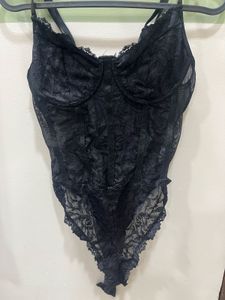 Sheer black bodysuit