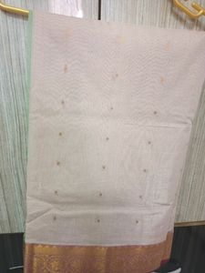 Off white saree with pink border