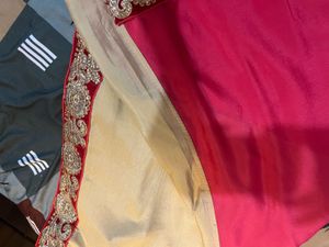 Elegant Pink & Gold Saree