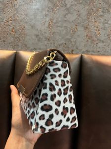 MINI WEST Sling Bag
