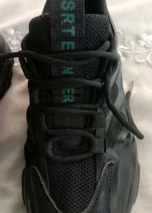 black chunky sole shoe