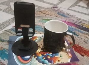 I am Selling Mobile Phone Stand and a Coffee Cup