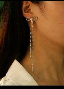 ✨ “Pearl Bow Glam Earrings”