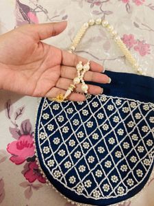 Elegant Heavy Blue Pearl Potli Bag with Tassels