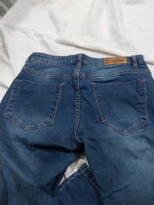 Distressed Blue Denim Jeans