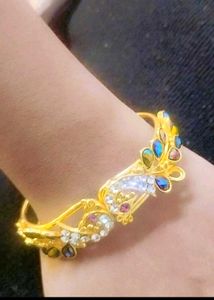 Elegant Gold-Tone Peacock Bracelet