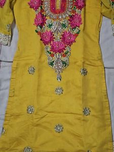 Yellow Kurti With Pink Embroidery