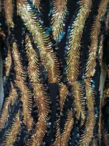 FEATHER PRINT SEQUINNED JUMPSUIT