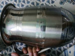 Steel Kitchen Canisters And Glass Jug