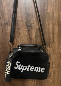 Black 'Supteme' Sling bag