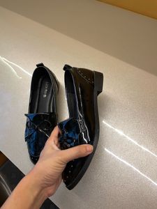 new bright shiny black westside loafers