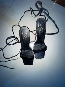 Black High Heels With Laces Or Strips