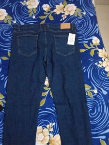 Ripped Dark Blue Jeans
