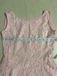 Lace peplum coquette top