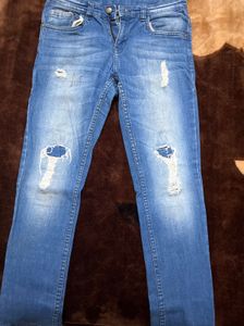 Ripped Blue Denim Jeans