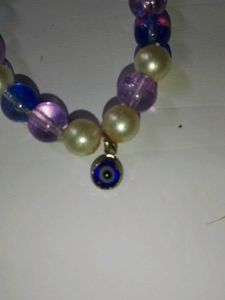 Beaded Bracelet with Evil Eye Charm