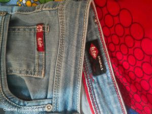 Distressed Denim Jeans