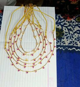 Gold Tone Necklace with Purple Accents