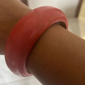 combo of wooden, golden and designer bangles