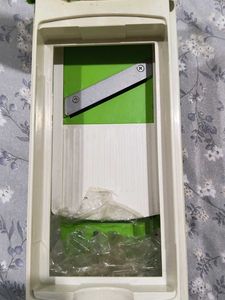 multipurpose green chopper with 7 attachments