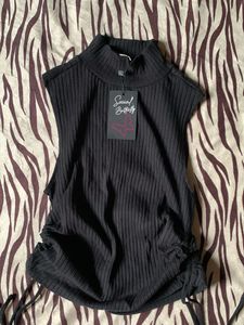 Sleeveless Ribbed Mock Neck Top