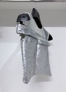 Silver flip‑sequin padded crop top