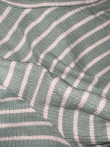 green and white striped top