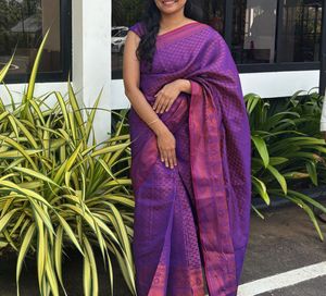 Its A Beautiful Purple Saree With Pretty Blouse